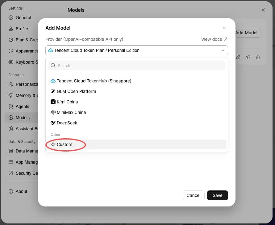 WorkBuddy's Add Model dialog with the Provider dropdown open, labelled "OpenAI-compatible API only", listing Tencent Cloud TokenHub, GLM Open Platform, Kimi China, MiniMax China, and DeepSeek, with a red circle around Custom under the Other group